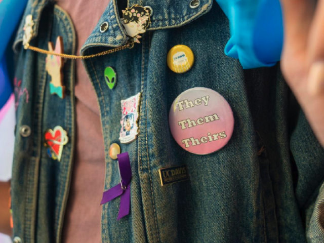 Person wearing buttons