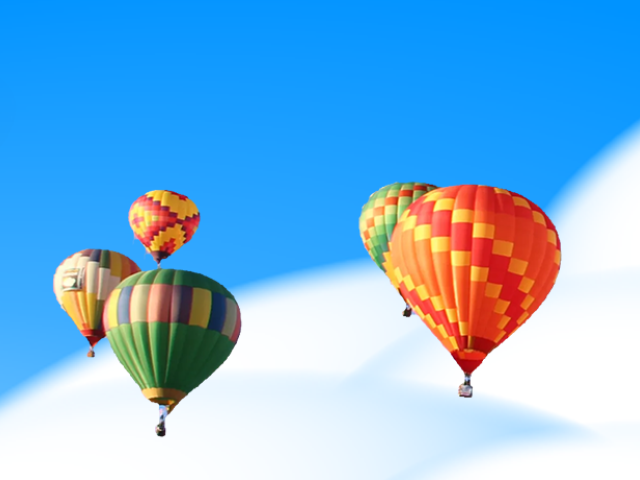 hot air balloons above clouds in sky