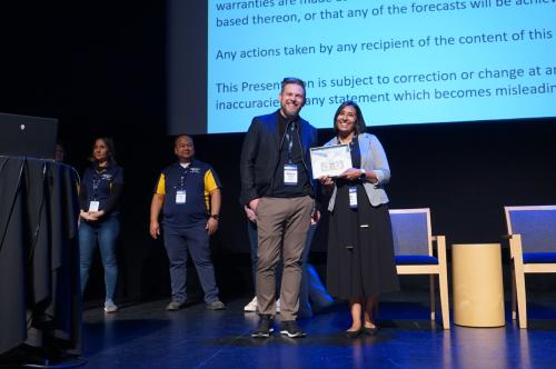 UC Riverside representatives, Matthew Gunkel and Azra Ayers, posing together with the "buck."